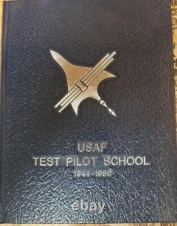 Chuck Yeager autographed test pilot school book